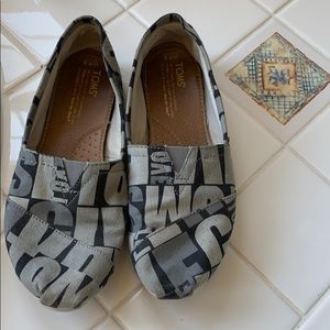 Toms black & Grey slip ons size 7.5 W
